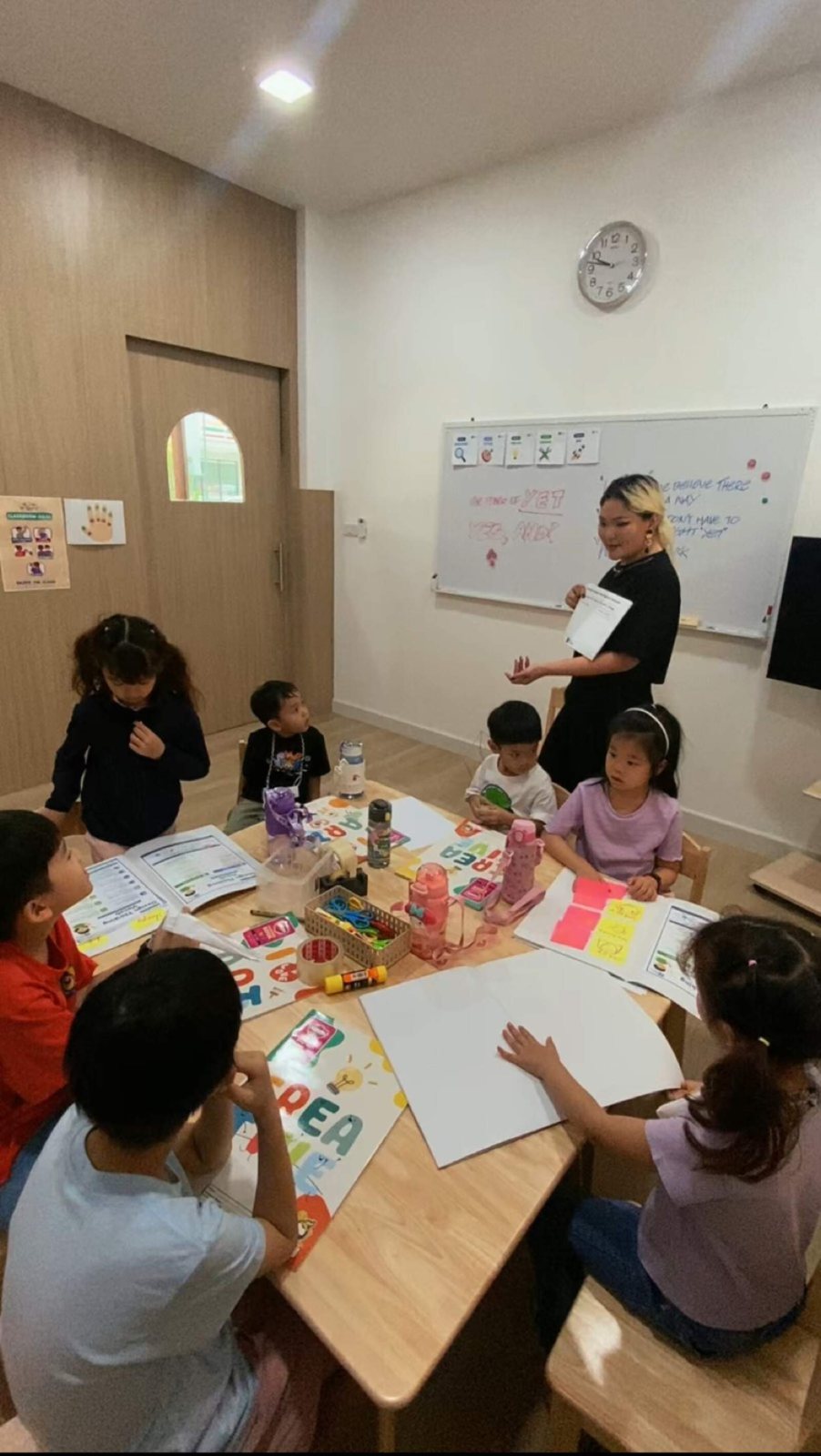 Children and a teacher together during an Arcko workshop